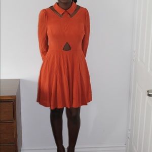 Burnt orange cut out dress.